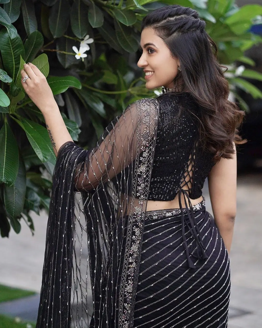 Tamil Actress Anju Kurian Stills in Sleeveless Black Saree